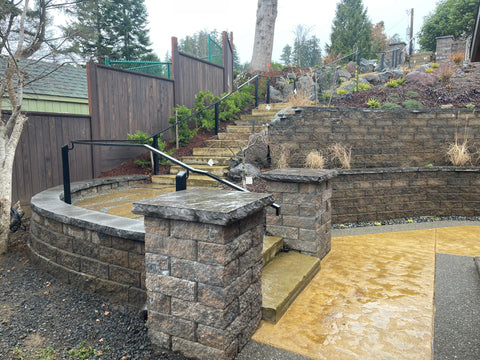 Retaining walls, stone steps, fencing and patio by Clean Rivers