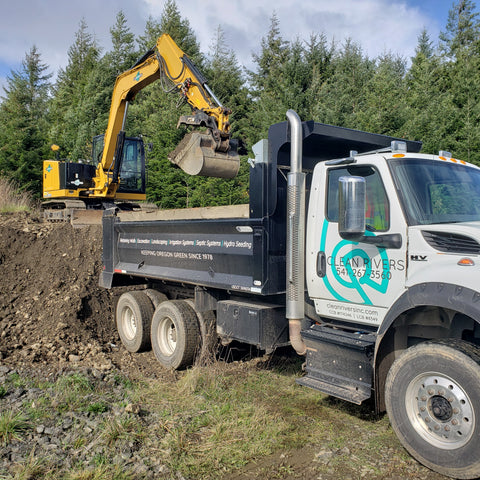 excavating using Clean Rivers trucks